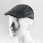 (Anthrazit) Schiebermütze Herren Tweed Flat Cap – Seitenansicht auf Mannequin