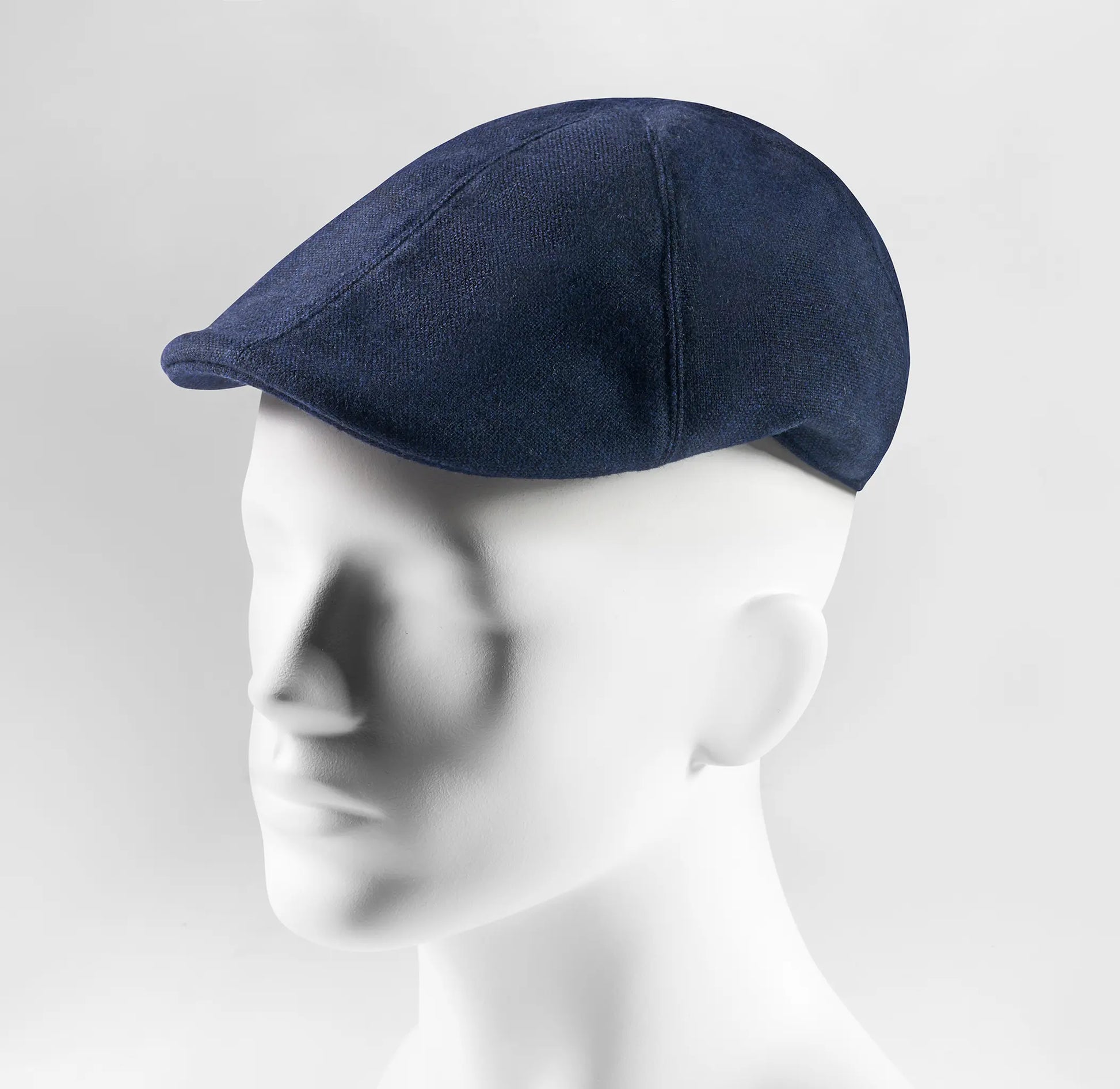 (Dunkelblau) Schiebermütze Herren Tweed Flat Cap – Seitenansicht auf Mannequin